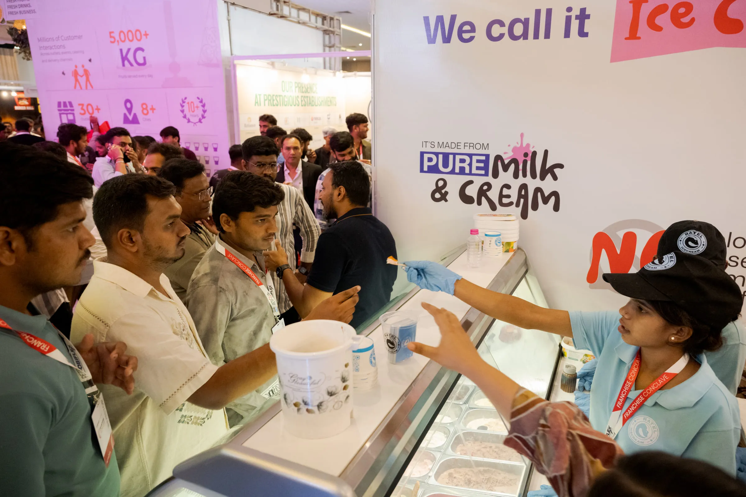Visitors being served at the Ratel Ice-Cream counter